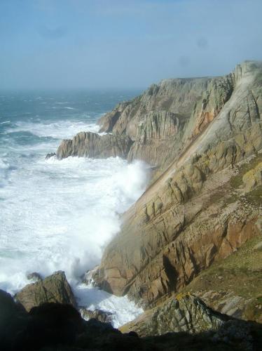 ’Devil’s Slide’ - Lundy Island’s most famous rock climb goes up the inclined slab of granite; the climb is approx. 400ft (120m). On this day the wind was near hurricane force, and the waves were enormous - so unsurprisingly we didn’t climb it ! (Author: Mike Wood)