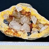 Calcite and Sphalerite on DolomiteAfloramientos Carretera Estatal 56, Canton, Condado Washington, Indiana, USAgeode is about 20 cm x 9 cm (Author: Bob Harman)