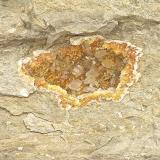 Calcite on DolomiteAfloramientos Carretera Estatal 56, Canton, Condado Washington, Indiana, USAoval geode about 17cm x 11cm (Author: Bob Harman)
