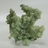 11cm. Prehnite from Southbury Ct.. Found in basalt vugs with few points of attachments. (Author: vic rzonca)