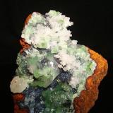 Adamite with calcite.
Ojuela mine, Mapimí, Durango, México.
8cm x 5.2cm x 4cm. (Author: Luis Domínguez)