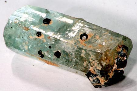 Aquamarine crystal with small schorl crystals: Erongo mountains, Namibia Size: 40 by 16 by 13mm (Author: Henk Viljoen)