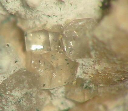 Clear fluellite crystals from Cornelia fieldspar mine, Hagendorf, Bavaria. Picture width 3 mm. (Author: Andreas Gerstenberg)