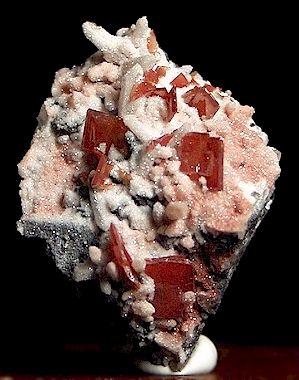 Wulfenite on Quartz and Drusy Quartz from Tsumeb.  4.5 X 3.5 cm. (Author: GneissWare)