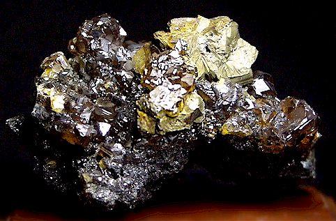 Chalcopyrite with Sphalerite

Commodore Mine
Creede District
Creede
Mineral County, Colorado
United States of America

4.5 x 7.0 cm overall
2.5 cm Chalcopyrite

These were produced about 5 or 6 years ago. (Author: GneissWare)