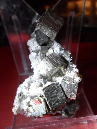 Pyrite and quartz
Bucium, Romania
5 cm (about 1 cm main crystal) (Author: David)