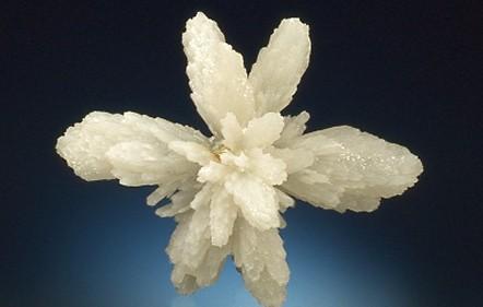 Here is one of my favorite pieces, an "artichoke" quartz from the Shangbao mine, Leiyang, Hunan, China, about 9 cm across. Scovil photo. (Author: Jordi Fabre)