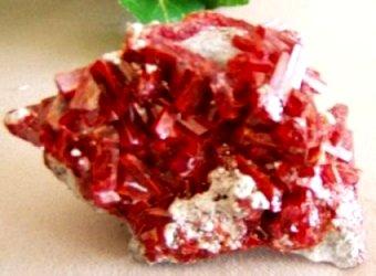 Realgar
Baia Sprie, Maramures, Romania 
Dimensions in cm: 5.5 x 4.2 x 3
Largest crystal in cm: 1 (Author: Leon56)