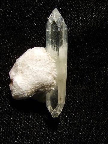 Fluorapophyllite on ’mesolite’
Moonen Bay, Isle of Skye, Scotland, UK
Crystal 23 mm

Apophyllite crystal 23mm on ’mesolite’. Self-collected 1994 from Moonen Bay, Isle of Skye. (Author: Mike Wood)