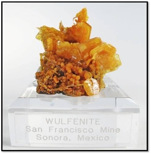 Wulfenite and Mimetite from San Francisco mine Mexico. Measures 4.5 x 4.5 x 4.2 cm and weighs 45 grams (Author: VRigatti)