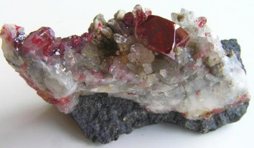 Cinabrio.
Mina de Almadén, Almadén, Ciudad real, Castilla La Mancha, España.
Tamaño 4,5x2x2,3 cm, cristal de 8,5x6x6 mm. Col. y foto Nacho Gaspar. (Autor: Nacho)