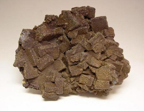 3655-Wulfenita y vanadinita, mina Erupción, Sierra de Los Lamentos, Chihuahua, México, 9,2x7,4x3,4 cm. (Autor: Edelmin)