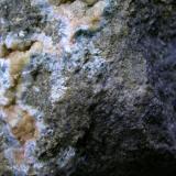 Clorita?
Cantera de Pórfido, La Alcoraya, Alicante, Comunidad Valenciana, España
100x100mm

Posible Clorita recubierta por otro mineral. (Autor: trencapedres)