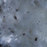 Detalle de ...Natrolita, Mesolita?  tamaño del cristal ( del pelo) 7 mm aprox. (Autor: Jose Bello)