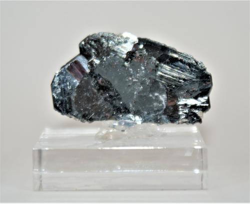 Hematite and Rutile<br />Cavradi, Curnera Valley, Tujetsch (Tavetsch), Vorderrhein Valley, Grischun (Grisons; Graubünden), Switzerland<br />40mm x 25mm x 5mm<br /> (Author: Philippe Durand)