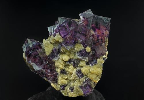 Fluorite, Muscovite<br />Yindu, Hexigten Banner (Kèshíkèténg Qí), Chifeng (Ulanhad), Inner Mongolia Autonomous Region, China<br />7.4 x 6.4 cm<br /> (Author: am mizunaka)