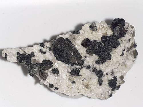 Cafarsite, Quartz, Muscovite,  Clinochlore (variety ripidolite)<br />Wannigletscher, Scherbadung (Monte Cervandone), Kriegalp Valley, Binn Valley (Binntal), Wallis (Valais), Switzerland<br />2,5 x 1,5 cm<br /> (Author: Volkmar Stingl)