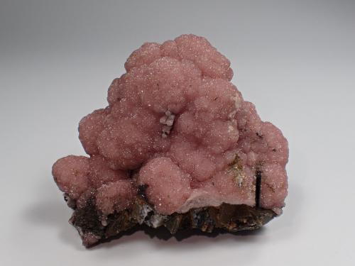 Rhodochrosite<br />Mina Potosí, Santo Domingo (Francisco Portillo), Distrito Santa Eulalia, Municipio Aquiles Serdán, Chihuahua, México<br />70 mm x 57 mm x 43 mm<br /> (Author: Don Lum)