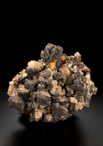 Bismuth with Dolomite and Erythrite<br />Gang Opal, level 371, Niederschlema, Bad Schlema (Schlema), Schlema-Hartenstein District, Erzgebirgskreis, Saxony/Sachsen, Germany<br />9 x 11 x 8 cm / main crystal: 2.2 cm.<br /> (Author: MIM Museum)