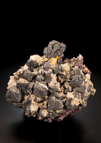 Bismuth with Dolomite and Erythrite<br />Gang Opal, level 371, Niederschlema, Bad Schlema (Schlema), Schlema-Hartenstein District, Erzgebirgskreis, Saxony/Sachsen, Germany<br />9 x 11 x 8 cm / main crystal: 2.2 cm.<br /> (Author: MIM Museum)
