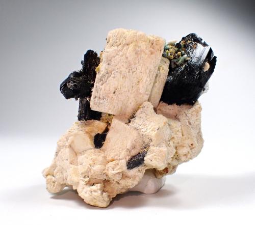 Feldspar (variety Carlsbad Twin), Beryl (variety alkali beryl), Schorl, Hyalite Opal<br />Erongo Mountain, Usakos, Erongo Region, Namibia<br />75 mm x 62 mm x 54 mm<br /> (Author: Don Lum)