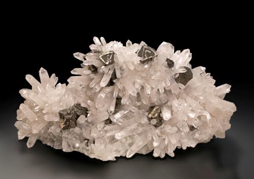 Stannite on Quartz<br />Lianzhou City (Lianxian), Qingyuan Prefecture, Guangdong Province, China<br />16.5 x 8.5 x 9.5 cm / main crystal: 1.9 cm.<br /> (Author: MIM Museum)