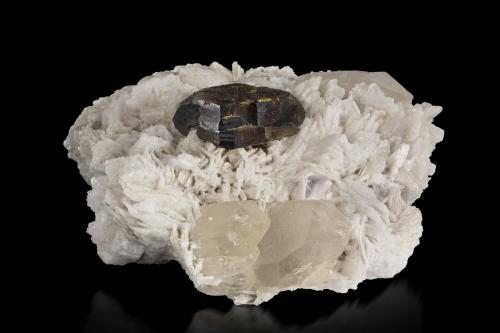 Stibiotantalite on Albite and with Quartz<br />Roundu Valley, Skardu District, Gilgit-Baltistan (Northern Areas), Pakistan<br />8 x 7 x 5 cm / main crystal: 2.8 cm.<br /> (Author: MIM Museum)