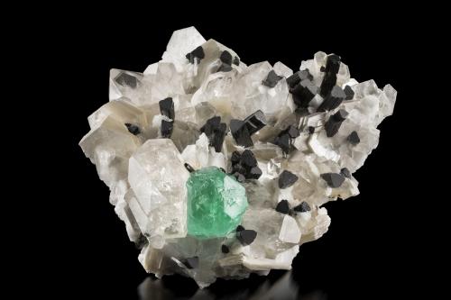 Fluorite with Quartz, Tourmaline (Group) and Mica (Group)<br />Stak Nala, Haramosh Mountains, Skardu District, Gilgit-Baltistan (Northern Areas), Pakistan<br />23 x 23 x 8 cm / main crystal: 5 cm<br /> (Author: MIM Museum)