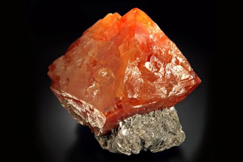 Scheelite on Muscovite<br />Pingwu Mine, Huya township, Mount Xuebaoding, Pingwu, Mianyang Prefecture, Sichuan Province, China<br />14 x 12.5 x 11 cm<br /> (Author: MIM Museum)