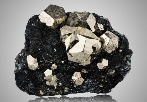 Pyrite with Hematite<br />Rio Mine (Rio Marina Mine), Valle Giove stope, Rio Marina, Elba Island, Livorno Province, Tuscany, Italy<br />25 x 13 x 17.5 cm / main crystal: 7.5 cm<br /> (Author: MIM Museum)