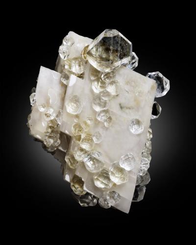 Fluorite on Calcite<br />Hexigten Banner (Kèshíkèténg Qí), Chifeng (Ulanhad), Inner Mongolia Autonomous Region, China<br />14 x 11 x 16 cm / main crystal: 4 cm<br /> (Author: MIM Museum)