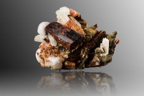 Manganoneptunite with Serandite, Natrolite and Analcime<br />Poudrette Quarry, Mont Saint-Hilaire, La Vallée-du-Richelieu RCM, Montérégie, Québec, Canada<br />5.5 x 5.5 x 4 cm / main crystal: 2.7 cm<br /> (Author: MIM Museum)