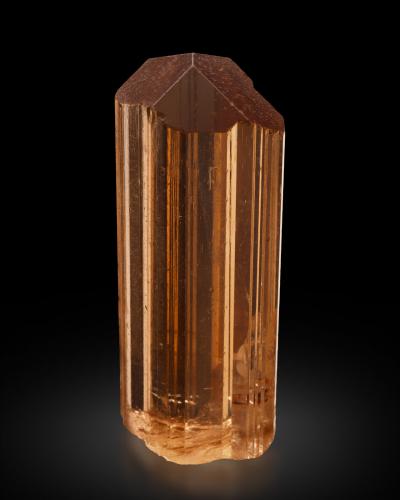 Scapolite<br />D-Block Mine, Merelani Hills, Lelatema Mountains, Simanjiro District, Manyara Region, Tanzania<br />2.5 x 2 x 7.5 cm / main crystal: 7.2 cm<br /> (Author: MIM Museum)