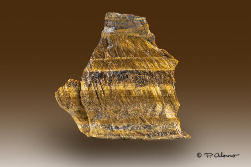 Cuarzo (variedad ojo de tigre)<br />Griquatown, Griqualand, Provincia Septentrional del Cabo, Sudáfrica<br />6,5cm x 6cm x 3cm<br /> (Autor: Pere Alonso)