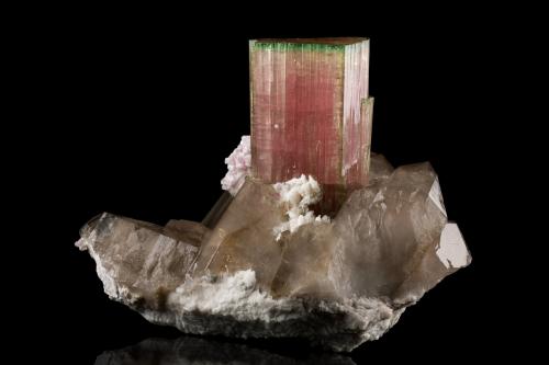 Elbaite with Quartz (variety smoky) and 'lepidolite'<br />Paprok, Kamdesh District, Nuristan Province, Afghanistan<br />19 x 14 x 14.5 cm / main crystal: 9.2 cm.<br /> (Author: MIM Museum)
