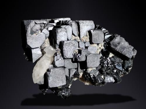 Galena, Sphalerite and Calcite (variety manganoan calcite)<br />Borieva Mine, Madan mining area, Rhodope Mountains, Smolyan Oblast, Bulgaria<br />73 mm × 57 mm × 27 mm<br /> (Author: Firmo Espinar)