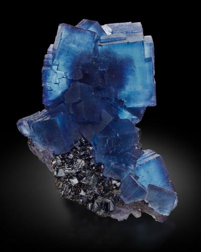 Fluorite, Sphalerite, Baryte<br />Denton Mine, Rosiclare formation, Goose Creek Mine group, Harris Creek Sub-District, Hardin County, Illinois, USA<br />12.6 x 10 x 11.8 cm / main crystal: 7.2 cm<br /> (Author: MIM Museum)