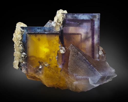 Fluorite with Chalcopyrite inclusions, Calcite<br />Denton Mine, Rosiclare formation, Goose Creek Mine group, Harris Creek Sub-District, Hardin County, Illinois, USA<br />8.6 x 7.5 x 10.5 cm / main crystal: 8.8 cm<br /> (Author: MIM Museum)