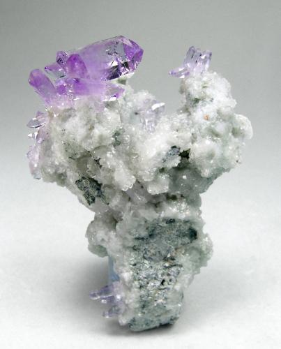 Quartz (variety amethyst) with Calcite<br />Capurru Quarry, Osilo, Sassari Province, Sardinia/Sardegna, Italy<br />5.5 × 3.9 × 2.8 cm<br /> (Author: Jordi Fabre)