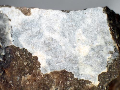 Galliskiíta, Triplita<br />Pegmatita Gigante, Distrito Candelaria, Departamento Cruz del Eje, Provincia Córdoba, Argentina<br />Campo de visión 14 mm.<br /> (Autor: Antonio P. López)