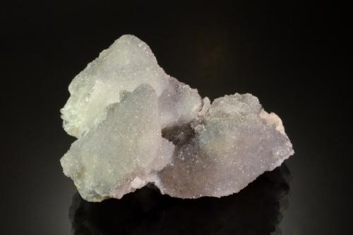 Quartz on Danburite<br /><br />6.3 x 4.4 x 3.2 cm<br /> (Author: Michael Shaw)