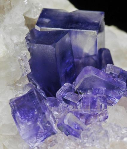 Fluorite on Quartz<br />Llamas Quarry, Obdulia vein, Caravia mining area, Las Cabañas, Duyos, Caravia, Comarca Oriente, Principality of Asturias (Asturias), Spain<br />6 × 4.8 × 3.6 cm<br /> (Author: Jordi Fabre)