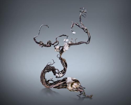 Plata con Calcita<br />Distrito minero Kongsberg, Kongsberg, Noruega<br />10 x 4 x 15 cm<br /> (Autor: Museo MIM)