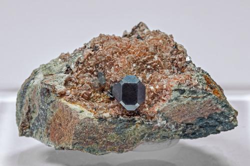 Cuprite on Calcite<br />Mashamba West Mine, Kolwezi District, Lualaba, Katanga Copper Crescent, Katanga (Shaba), Democratic Republic of the Congo (Zaire)<br />3.9 × 2.7 × 2.5 cm<br /> (Author: Jordi Fabre)