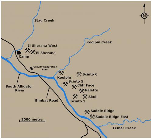 LOCATION PHOTO

Map of the location of the El Sherana mine within the South Alligator Uranium field. About 2 kilometres south of the main camp via Gimbat road is the location of the gravity Separation plant which was demolished sometime in the late 80’s or early 90’s. The location of the site of the plant is still clearly visible in recent (ca. 2023) aerial photographs.



The area contains numerous deposits of Uranium which were exploited from about 1953 to 1970. The first discovery of Uranium in the area occurred at Coronation Hill some 13 kilometers south–east of the El Sherana mine. The discovery was made in 1953 on Coronation day (June 2nd) by B. P. Walpole a Geologist working for the Bureau of Mineral Resources. 

The most colourful deposit in the whole Uranium field was the Palette mine located about 7 kilometers south-east of El Sherana. It was reached by a winding, precipitous road whose access was often cut by the flooding of the South Alligator River during the wet season. It was at the same elevation as El Sherana. The Palette mine was a large fan shaped deposit adjoining a sheer white cliff face. Joe Fisher, mining consultant and pioneer of Uranium mining in South Alligator River, named the site ‘palette’ because he said the Uranium mineralisation reminded him of the colourful daubs of paint one might see on an artist’s palette. Eyewitness accounts spoke of a truly colourful place glittering magnificently in the sunlight where the hues of blackish Uraninite, orange Gummite, lime-green Autunite, apple-green Torbernite and dark-yellow Soddyite were clearly visible even from a distance of a hundred metres or more. 

John Webb, who was the field Superintendant with the Australian Atomic Energy Commission’s at the time (1958) stated that many of the secondary Uranium minerals recovered at the Palette mine were superb collector pieces too good to be broken up and sold as ordinary Uranium ore. Regrettably few if any ‘collector quality’ specimens from this mine can be seen in modern day mineral collections.

Other mines in the area include but are not limited to Koolpin, Scinto, Cliff Face, Skull and Saddle Ridge. UUNL records indicate that El Sherana was the largest producer of Uranium ore in the region. (Author: silvia)