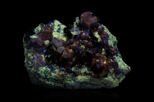 Sodalite with Pyrite and Wurtzite<br />Badakhshan Province, Afghanistan<br />6.5 x 4.5 x 3.5 cm / main crystal: 1.1 cm.<br /> (Author: MIM Museum)