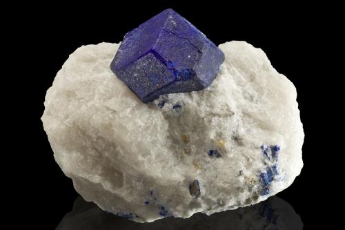 Lazurite<br />Sar-e Sang, Koksha Valley, Khash & Kuran Wa Munjan Districts, Badakhshan Province, Afghanistan<br />9 x 7 x 6 cm / main crystal: 3.7 cm.<br /> (Author: MIM Museum)