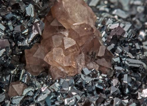 Hematite with Quartz (variety smoky)<br />Brézouard, Les Vosges Massif, Lapoutroie, Ribeauvillé, Haut-Rhin, Grand Est, France<br />Overall specimen size: 9.3 × 8.4 × 4.7 cm<br /> (Author: Jordi Fabre)