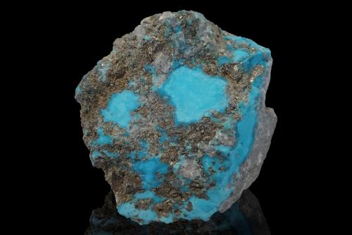Turquoise with Pyrite<br />Shahr-e Babak, Shahr-e Babak County, Kerman Province, Iran<br />7 x 7 x 6.5 cm<br /> (Author: MIM Museum)