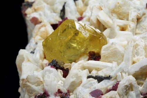 Londonite on Albite and Fluor-liddicoatite<br />Antsahanana Quarry, Sahatany Valley (Mt. Ibity), Antsirabe II District, Vakinankaratra Region, Madagascar<br />9.5 x 6 x 3 cm / main crystal: 2.1 cm.<br /> (Author: MIM Museum)